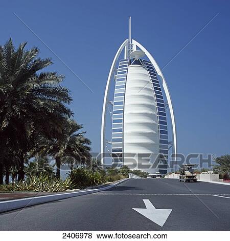 Stock Photo - Arrow sign painted on road, Burj Al Arab Hotel, Dubai, United Arab Emirates . Fotosearch