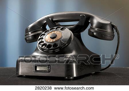 Stock Photo - black bakelite telephone, close-up . Fotosearch