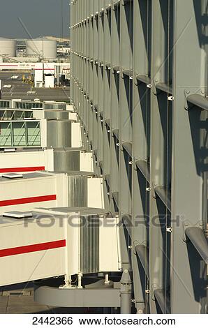Boarding bridge at airport, Heathrow, London, England View Large Photo Image Stock Photograph - Boarding bridge at airport, Heathrow, London, England . Fotosearch