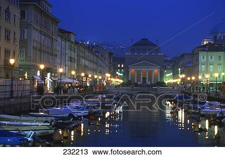 Boats in canal at dusk, Grand Canal, Friuli-Venezia Giulia, Trieste, Italy View Large Photo Image Stock Image - Boats in canal at dusk, Grand Canal, Friuli-Venezia Giulia, Trieste, Italy . Fotosearch