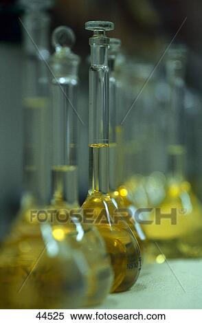Stock Photography - Bottles with sample oils in laboratory . Fotosearch