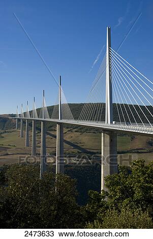 Stock Image - Bridge across valley, Millau Viaduct, Millau, Aveyron, Midi-Pyrenees, France . Fotosearch