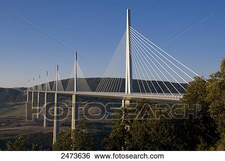 Bridge across valley, Millau Viaduct, Millau, Aveyron, Midi-Pyrenees, France View Large Photo Image Stock Photograph - Bridge across valley, Millau Viaduct, Millau, Aveyron, Midi-Pyrenees, France . Fotosearch