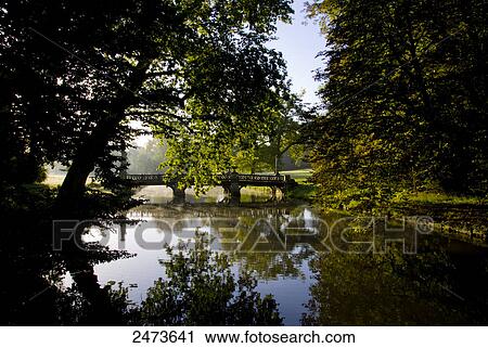 Bridge over river, Chantilly, Oise, Picardy, France View Large Photo Image Stock Image - Bridge over river, Chantilly, Oise, Picardy, France . Fotosearch