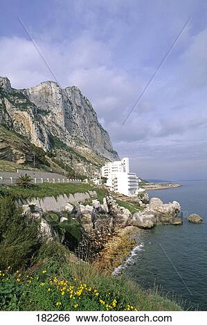 Stock Photograph - Building at coast, Rock of Gibraltar, Gibraltar . Fotosearch