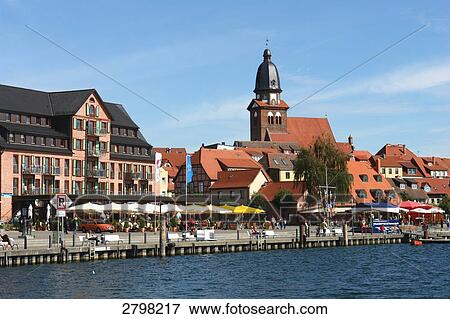 Stock Photo - Buildings at waterfront, Waren, Muritz, Mecklenburg-Western Pomerania, Germany . Fotosearch