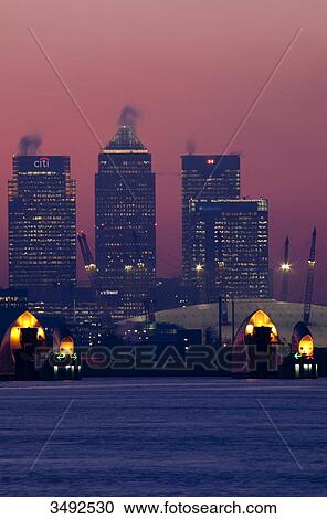 Stock Image - Canary Wharf and Thames Barrier, London, UK, Europe . Fotosearch