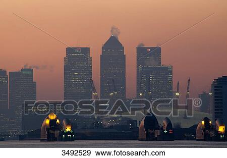 Stock Photo - Canary Wharf and Thames Barrier, London, UK, Europe . Fotosearch