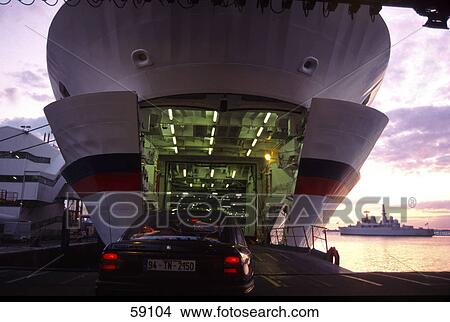 Car loading onto ship, Portsmouth Harbour, Hampshire, England View Large Photo Image Picture - Car loading onto ship, Portsmouth Harbour, Hampshire, England . Fotosearch