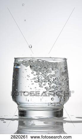 carbonated water in a glass, close-up View Large Photo Image Stock Image - carbonated water in a glass, close-up . Fotosearch