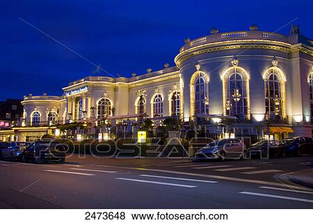 Casino lit up at dusk, Deauville, Cote Fleurie, Basse-Normandy, France View Large Photo Image Stock Photo - Casino lit up at dusk, Deauville, Cote Fleurie, Basse-Normandy, France . Fotosearch
