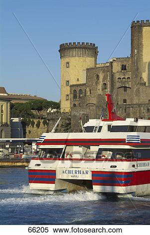 Castle at waterfront viewed from ferry port, Castel Nuovo, Naples, Campania, Italy View Large Photo Image Stock Photography - Castle at waterfront viewed from ferry port, Castel Nuovo, Naples, Campania, Italy . Fotosearch