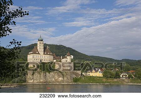 Stock Photo - Castle on hill at riverside, Wachau, Austria . Fotosearch