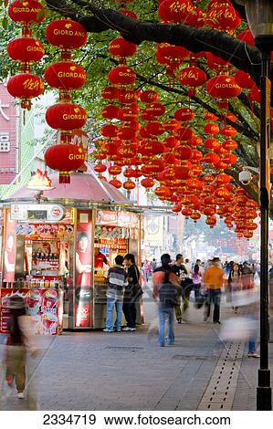 Stock Photo - Chinese lanterns hanging on tree in street, Guangzhou, Guangdong Province, China . Fotosearch
