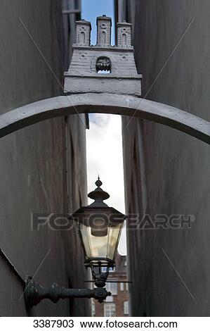 City coat of arms and lamp on an exterior wall in an alley, Hamburg, Germany, low angle view View Large Photo Image Stock Image - City coat of arms and lamp on an exterior wall in an alley, Hamburg, Germany, low angle view . Fotosearch