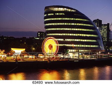 Stock Image - City hall illuminated at night, London, France, Europe . Fotosearch