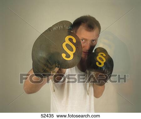 Close-up of man boxing View Large Photo Image Stock Photography - Close-up of man boxing . Fotosearch