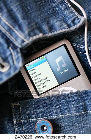 Close-up of mp3 player in pocket of jacket View Large Photo Image Stock Photograph - Close-up of mp3 player in pocket of jacket . Fotosearch