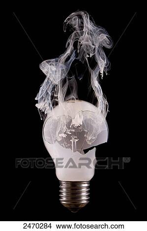 Close-up of smoking light bulb View Large Photo Image Picture - Close-up of smoking light bulb . Fotosearch