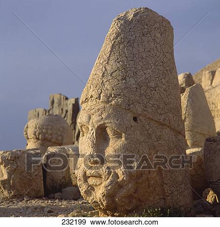 Stock Photo - Close-up on stone sculptures, Mount Nemrut, Turkey . Fotosearch