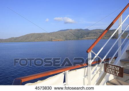 Stock Image - Cruise liner in front of Komodo, Indonesia, Asia . Fotosearch
