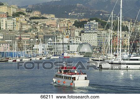 Stock Image - Cruise ship and boats at harbor, Genoa, Liguria, Italy . Fotosearch