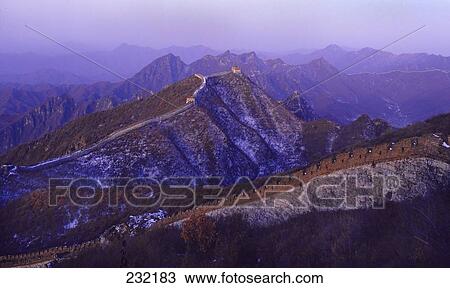 Stock Image - Defensive wall on mountain range, Mutianyu, Great Wall Of China, China . Fotosearch