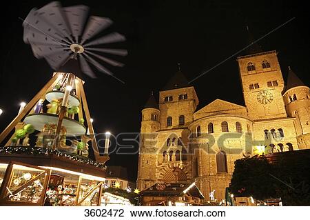 Stock Image - Dome and Christmas pyramid at night, Trier, Germany . Fotosearch