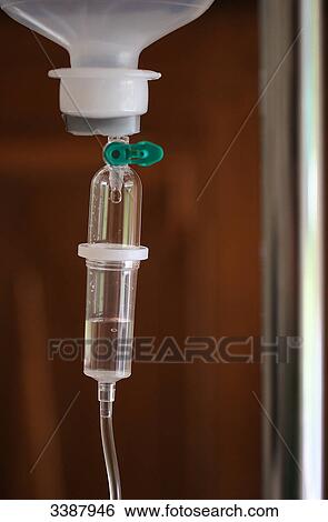 Drip and drip chamber, close-up View Large Photo Image Stock Photograph - Drip and drip chamber, close-up . Fotosearch