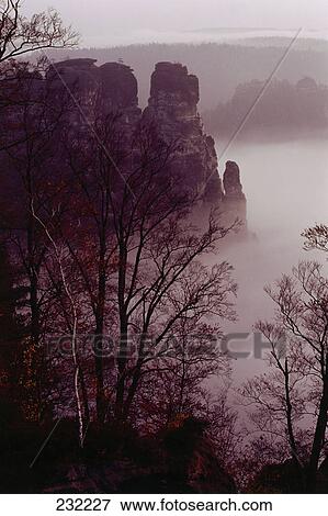 Elevated view on fog over Elbe Sandstone Mountains, Saxony, Germany View Large Photo Image Stock Photo - Elevated view on fog over Elbe Sandstone Mountains, Saxony, Germany . Fotosearch