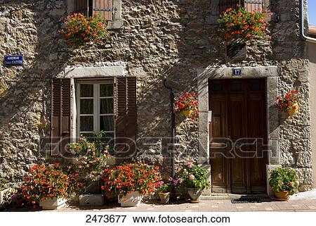 Stock Photo - Facade of house, Roquefort-Sur-Soulzon, Aveyron, Midi-Pyrenees, France . Fotosearch