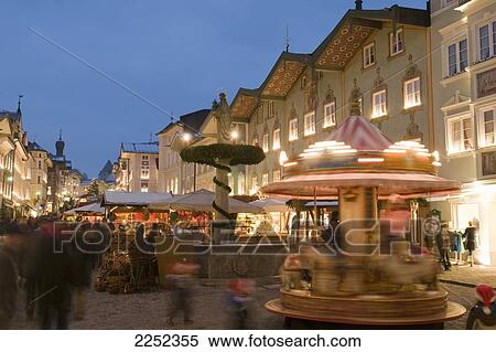 Fairground rides lit up in festival, Bavaria, Germany View Large Photo Image Stock Photography - Fairground rides lit up in festival, Bavaria, Germany . Fotosearch