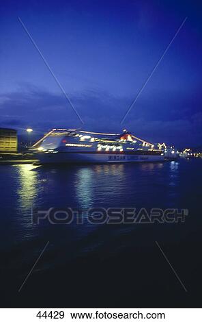 Stock Photo - Ferry lit up at harbor, Piraeus Harbor, Piraeus, Greece . Fotosearch