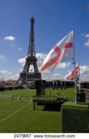 Flags fluttering in front of tower, Eiffel Tower, Paris, Ile-de-France, France View Large Photo Image Stock Photo - Flags fluttering in front of tower, Eiffel Tower, Paris, Ile-de-France, France . Fotosearch