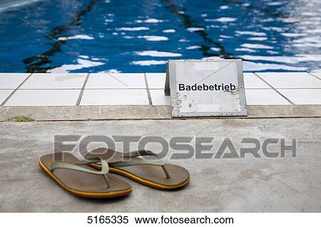 Flip-flops in indoor swimming pool View Large Photo Image Stock Photography - Flip-flops in indoor swimming pool . Fotosearch