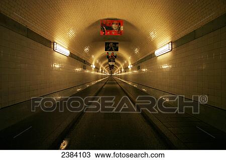 Fluorescent lights lit up on wall in tunnel, Old Elbe Tunnel, Hamburg, Germany View Large Photo Image Stock Image - Fluorescent lights lit up on wall in tunnel, Old Elbe Tunnel, Hamburg, Germany . Fotosearch