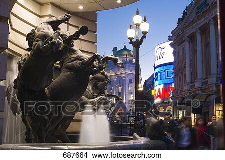 Fountain near statue, Piccadilly Circus, City of Westminster, London, England View Large Photo Image Picture - Fountain near statue, Piccadilly Circus, City of Westminster, London, England . Fotosearch