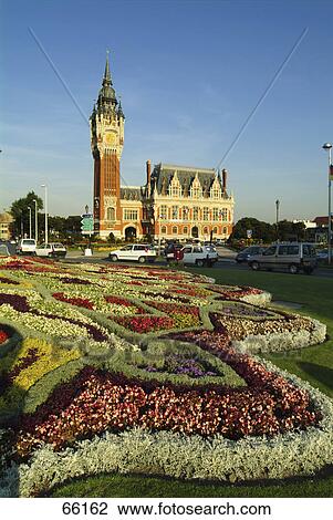 Stock Image - Garden near hotel, Calais Hotel De Ville, Calais, Pas-De-Calais, France . Fotosearch