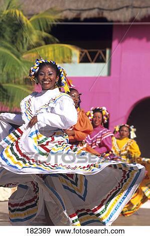Stock Photo - Group of female traditional latin dancers smiling, Costa Maya, Cozumel, Quintana Roo, Mexico . Fotosearch