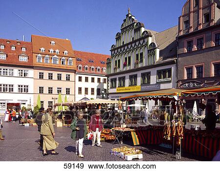 Stock Photo - Group of people walking at market place, Weimar, Thuringia, Germany, Europe . Fotosearch