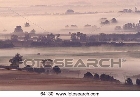 High angle view of a landscape in fog, Gemuender Au, Oberpfalz, Germany View Large Photo Image Stock Image - High angle view of a landscape in fog, Gemuender Au, Oberpfalz, Germany . Fotosearch
