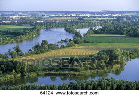 Picture - High angle view of river flowing through field, Danube River, Regensburg, Germany . Fotosearch