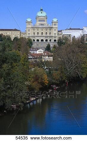 Stock Photography - High angle view of river in front of parliament building, Parliament Building, Aare River, Berne, Switzerland . Fotosearch