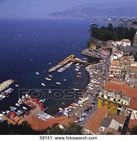 Stock Image - High angle view of town at coast, Sorrento, Neapolitan Riviera, Italy . Fotosearch