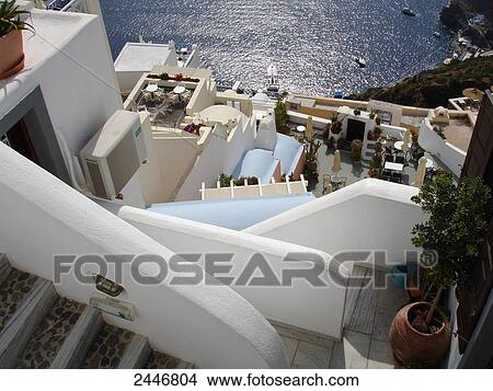 Picture - High angle view of town at seaside, Fira, Santorini, Cyclades Islands, Greece . Fotosearch