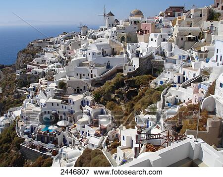 High angle view of town at seaside, Oia, Santorini, Cyclades Islands, Greece View Large Photo Image Stock Photo - High angle view of town at seaside, Oia, Santorini, Cyclades Islands, Greece . Fotosearch