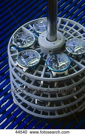 Stock Image - High angle view of watch mechanism . Fotosearch