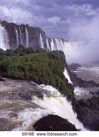 Stock Photograph - High angle view of waterfalls, Iguacu Falls, Argentina . Fotosearch
