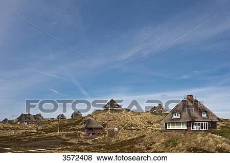 Holiday homes in dunes, Hoernum, Sylt, Germany View Large Photo Image Stock Photo - Holiday homes in dunes, Hoernum, Sylt, Germany . Fotosearch