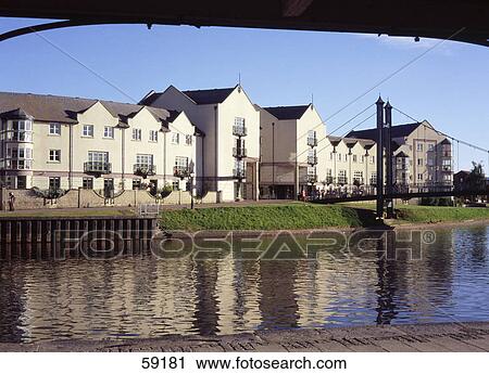 Houses along river, Devon, France, Europe View Large Photo Image Stock Image - Houses along river, Devon, France, Europe . Fotosearch